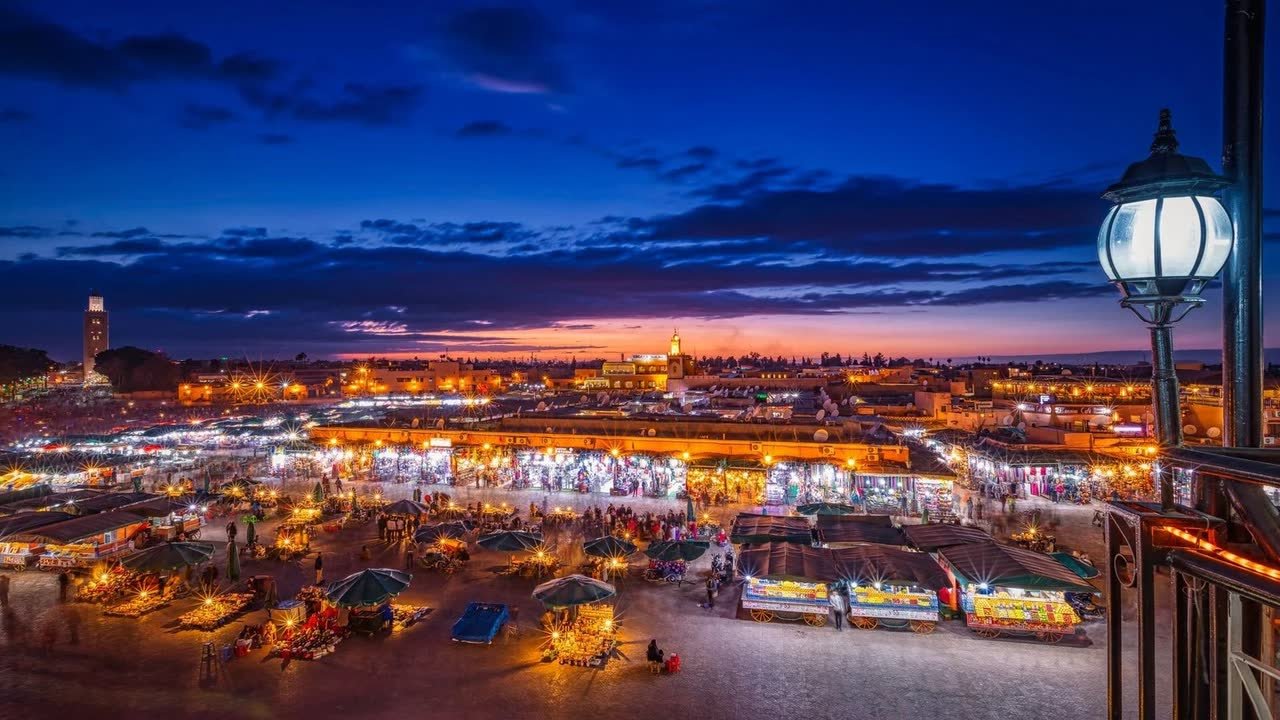 Marrakech's main square lit up at dusk