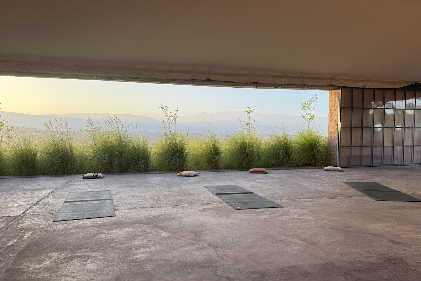 The open-air training studio at Kasbah Beldi, looking out to the mountains